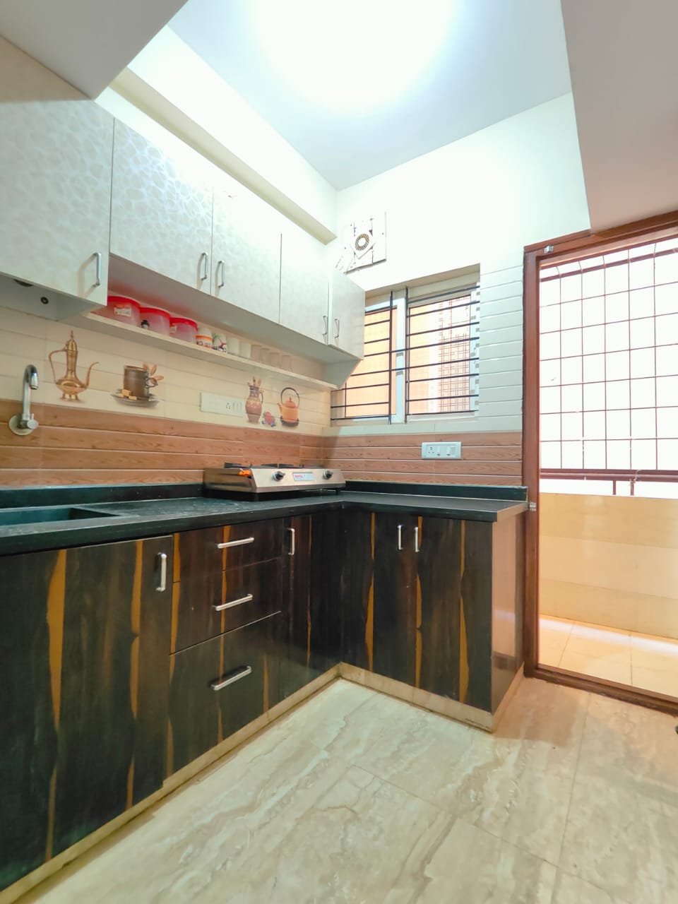 Elegant 2BHK Fully Furnished Flat for Rent | BTM 2 ND STAGE I Bangalore I Stylish, Move-In Ready I Kitchen https://renthouzz.in/