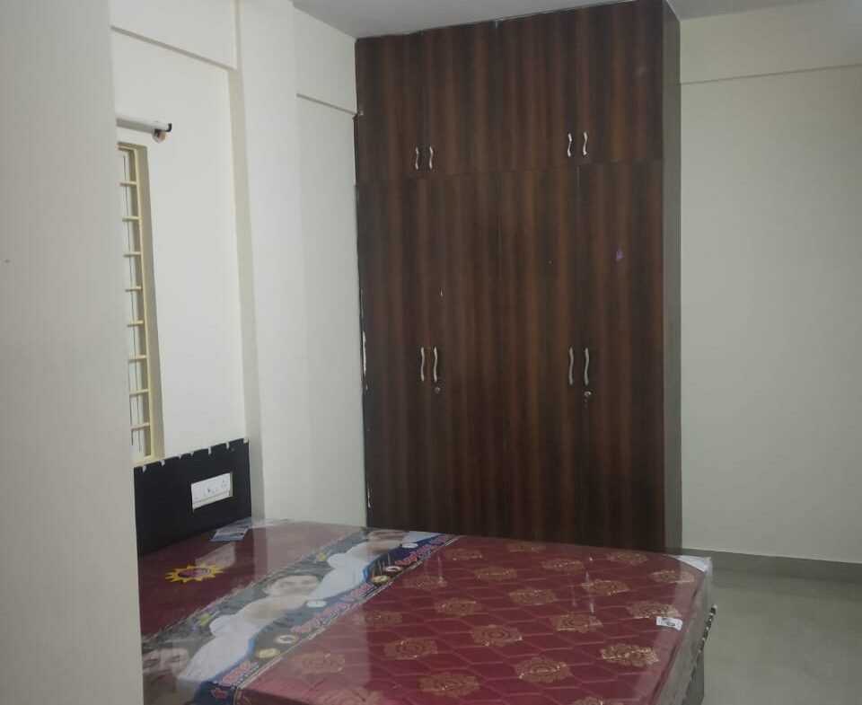 "Spacious 800 sqft 2BHK Flat for rent in BTM Layout 2nd Stage | Modern Construction & Excellent Ventilation | Ample Bike Parking Available" Bedroom https://renthouzz.in/