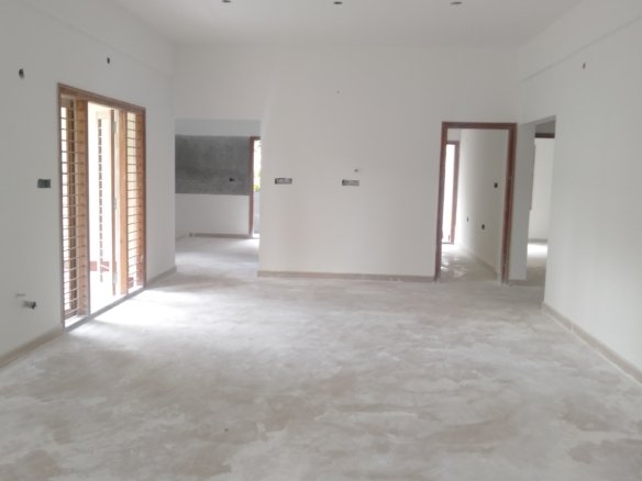 Spacious Living Room "Bright and airy living room in a brand new 3BHK apartment with large windows and modern decor." Nobo Nagar Kalena Agrahara Bangalore https://renthouzz.in/