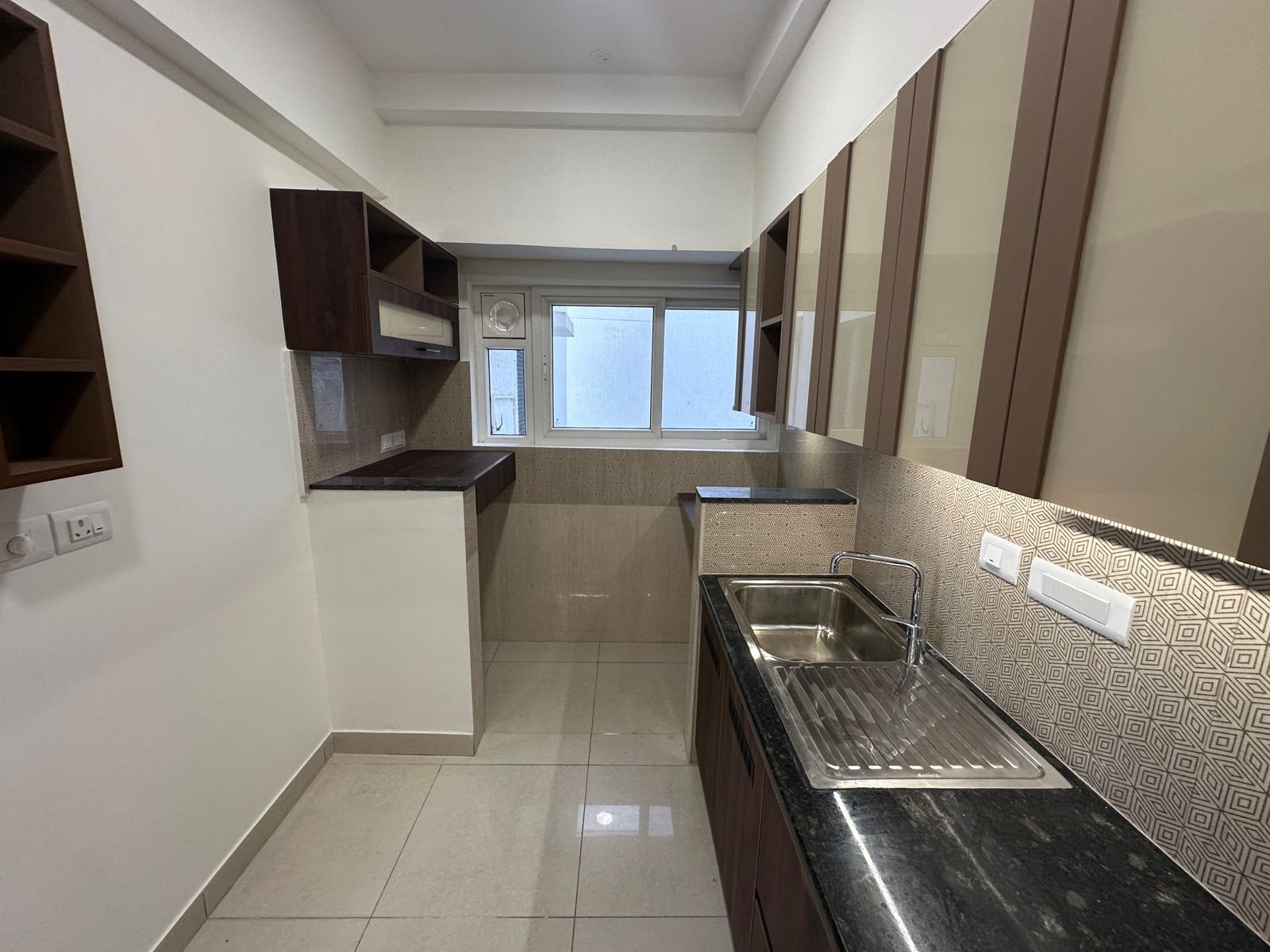 Modular kitchen in semi furnished 3BHK flat at Prestige Elysian