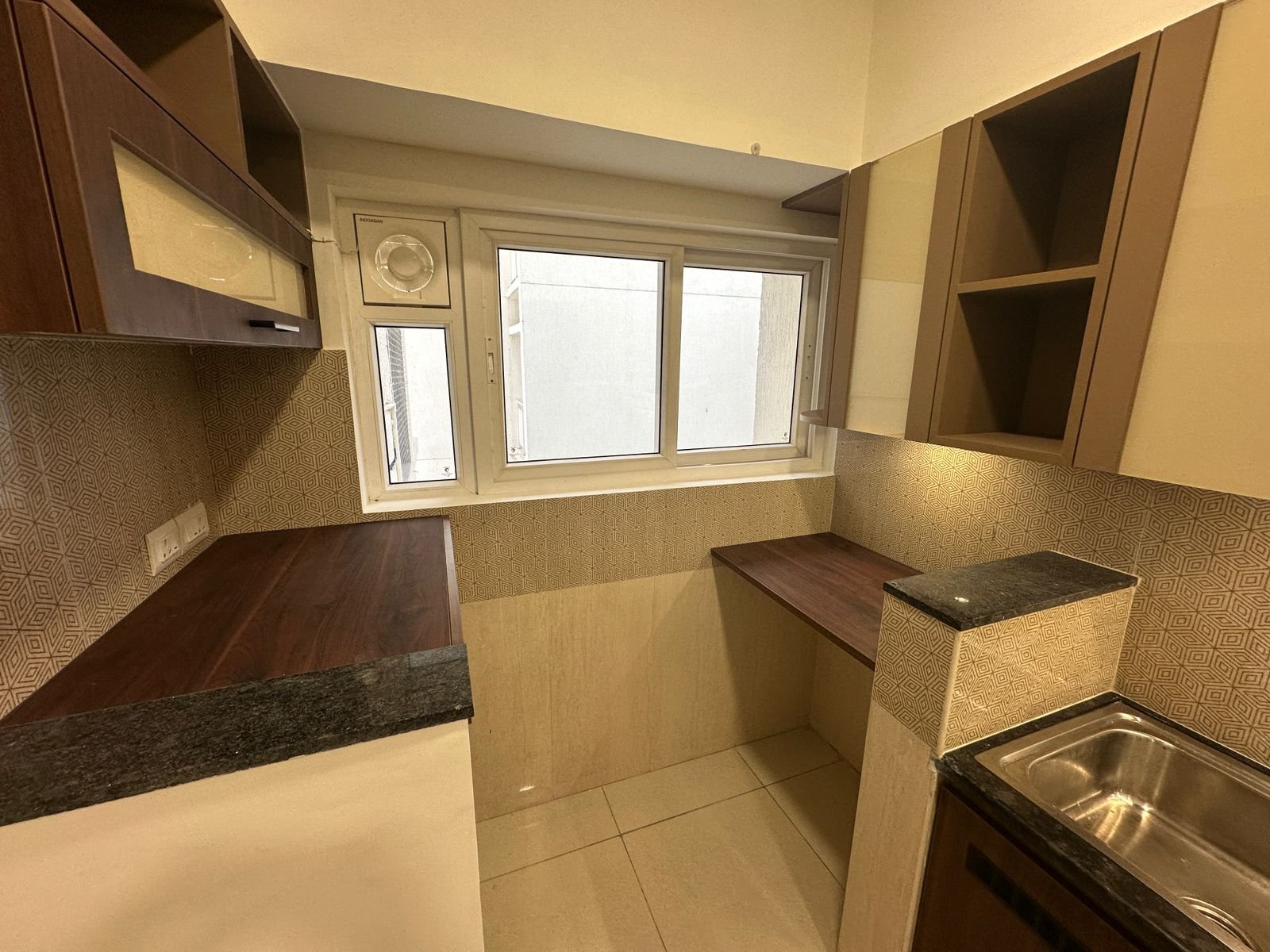 Modular kitchen in semi furnished 3BHK flat at Prestige Elysian