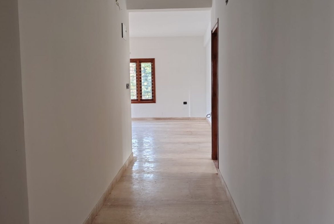 Common passage inside brand new 3BHK flat connecting hall to bedrooms in JP Nagar 8th Phase Bangalore