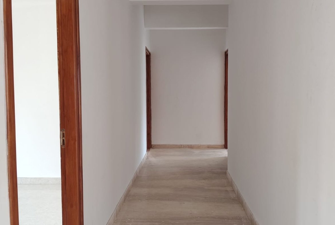 Common passage inside brand new 3BHK flat connecting hall to bedrooms in JP Nagar 8th Phase Bangalore