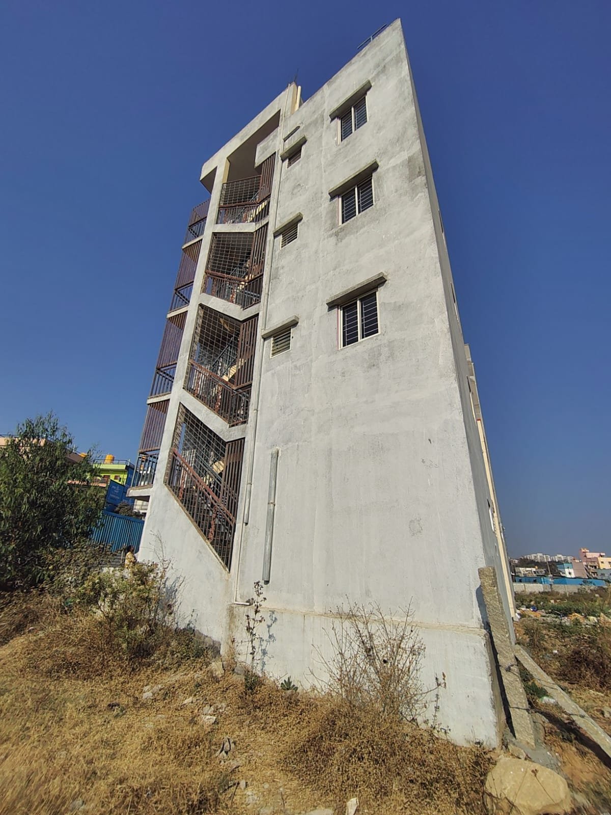 Independent G+3 Rental Income Building for Sale in Begur Near Vittasandra Main Road Exterior view of newly constructed G+3 rental income building on 20x30 plot in Balaji Layout near Vittasandra Main Road, Begur, Bengaluru