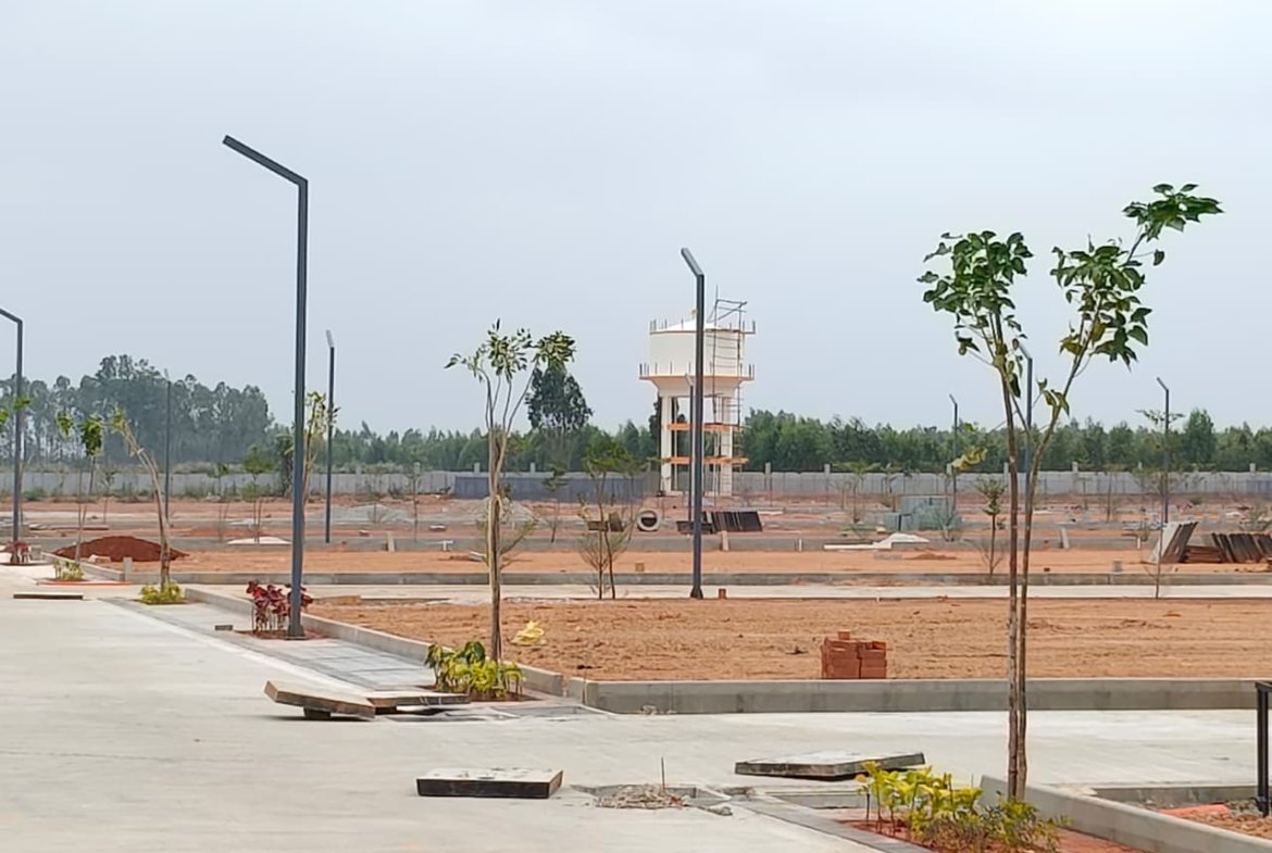 Master layout plan of BMRDA approved villa plots in Jigani near Electronic City Bangalore with roads, green spaces and premium plotted development.