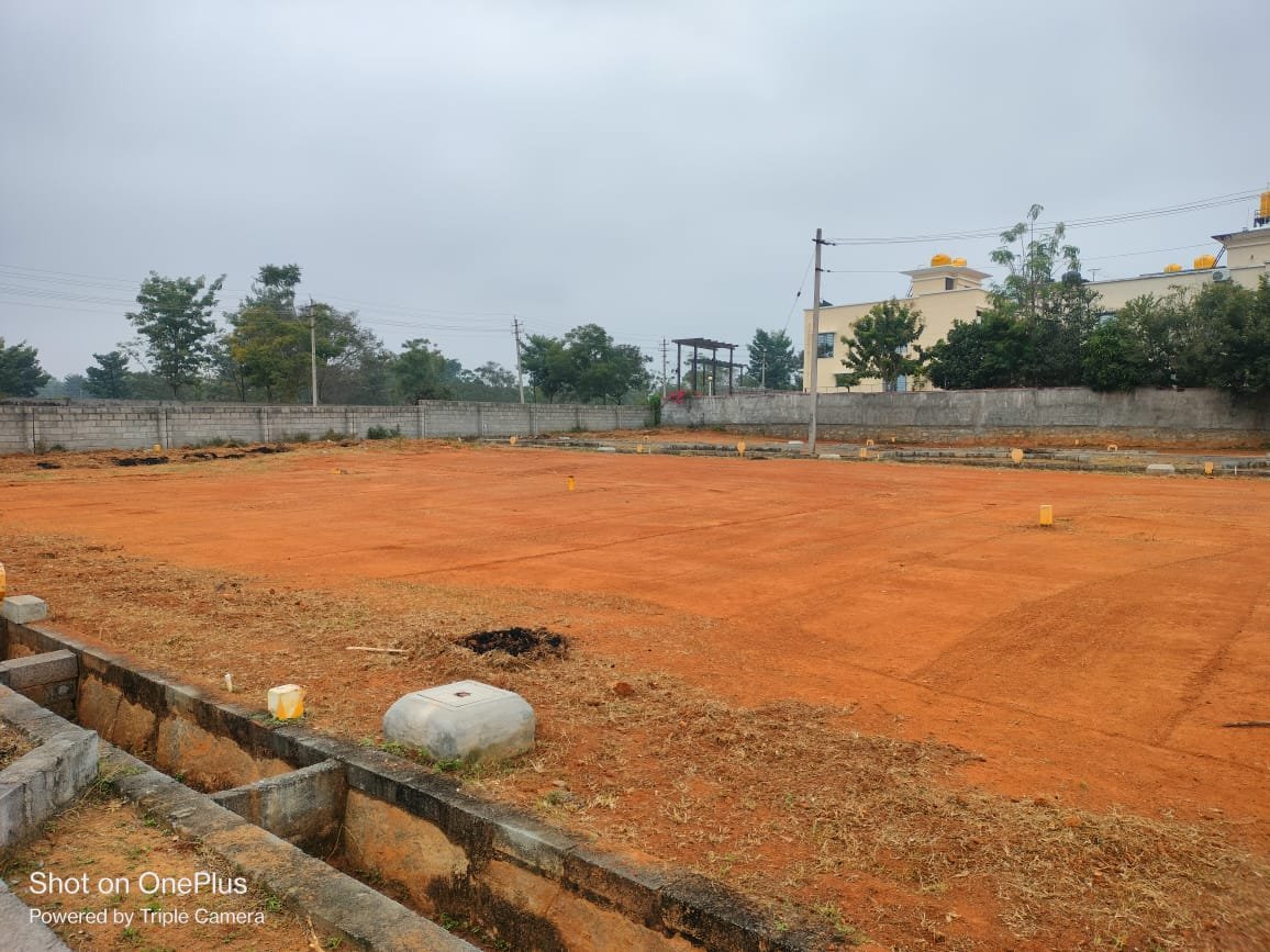 BMRDA A Khata approved residential plots in a gated community layout at Jigani near APC Circle with internal roads, parks, and modern infrastructure suitable for home construction and investment.