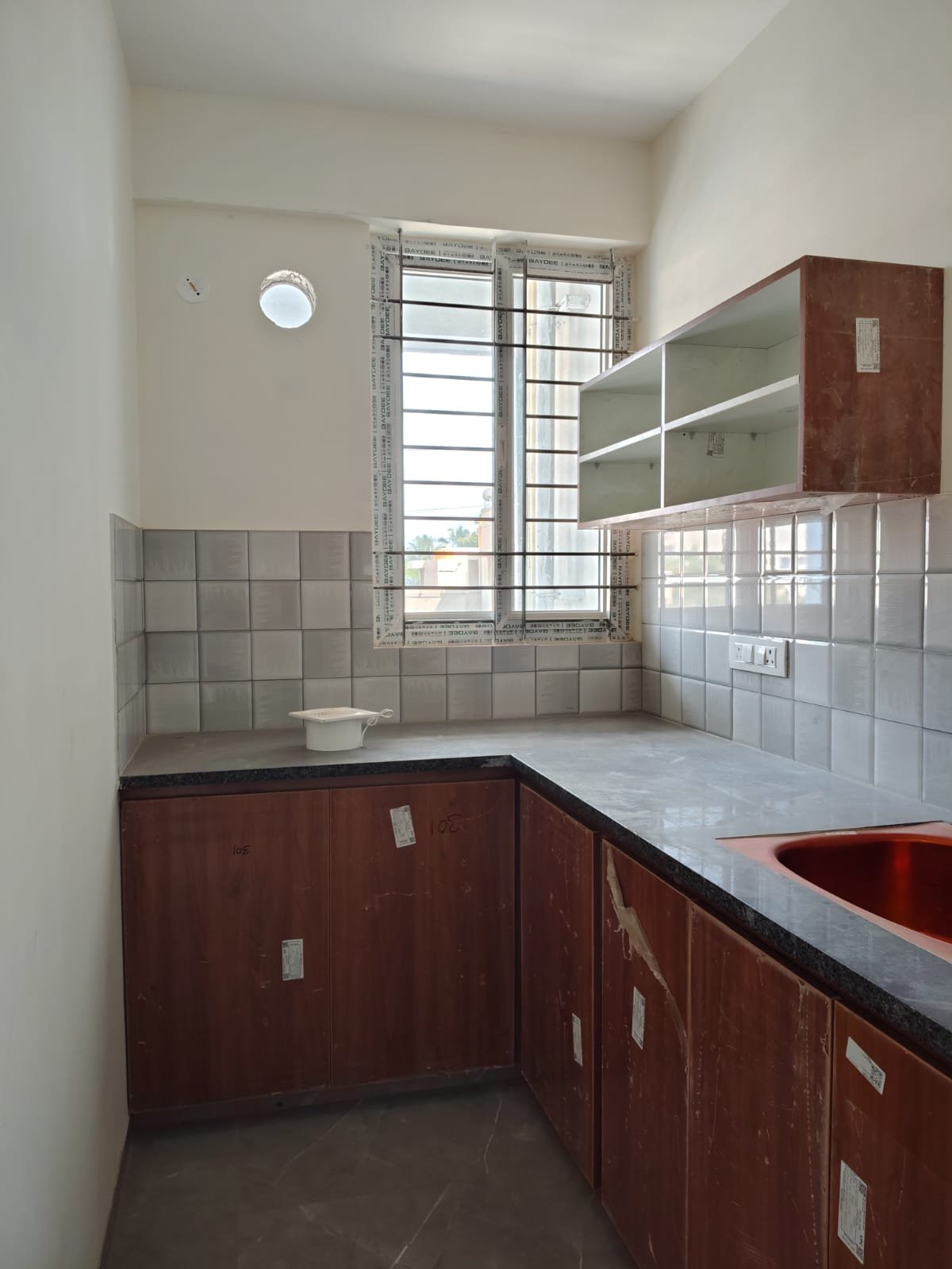 Fully equipped modular kitchen with appliances and storage space modular kitchen 1BHK fully furnished flat BTM Layout with fridge stove chimney