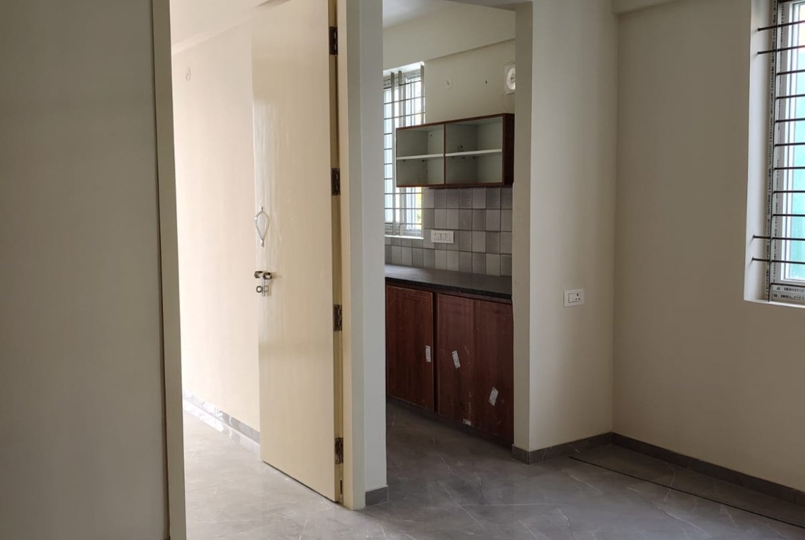 living room 1BHK fully furnished flat for rent BTM Layout sofa TV setup