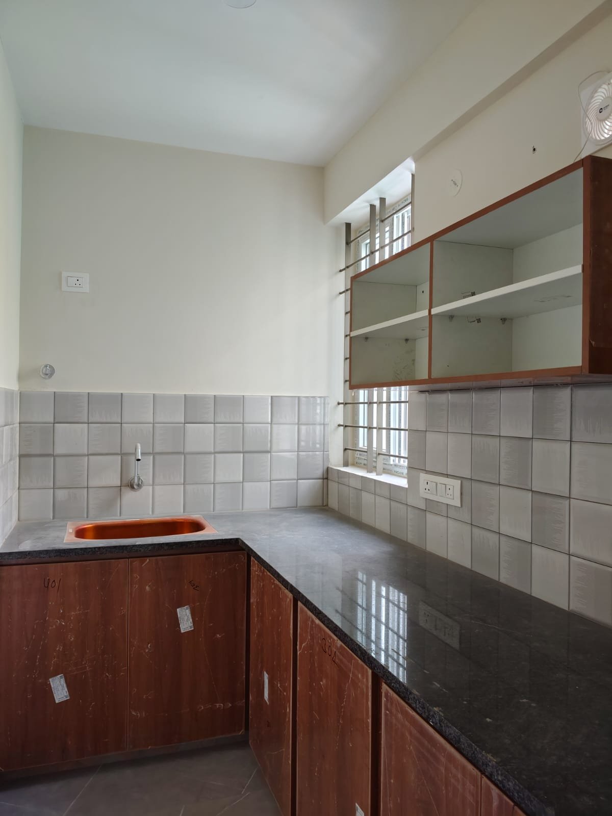 Fully equipped modular kitchen with appliances and storage space modular kitchen 1BHK fully furnished flat BTM Layout with fridge stove chimney