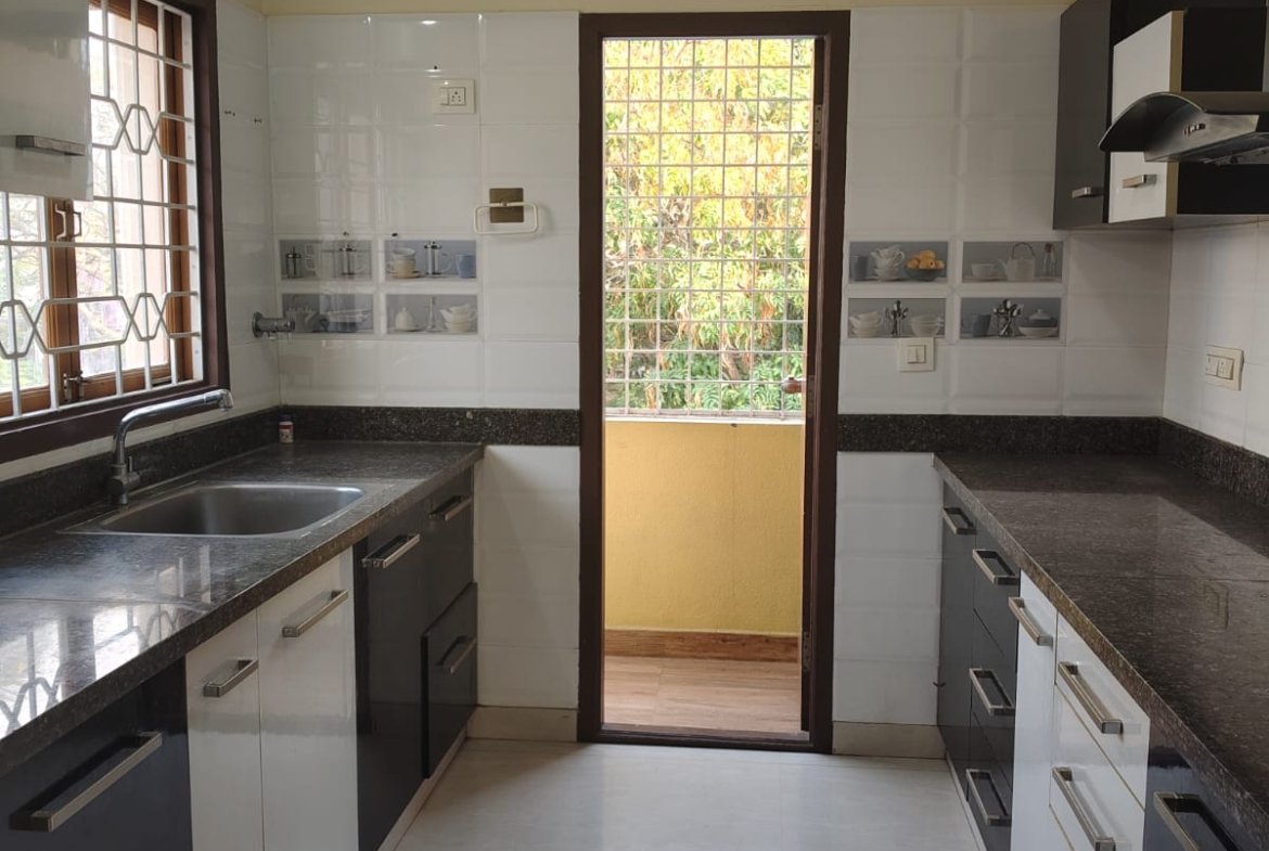 kitchen 2BHK semi furnished flat Koramangala cabinets utility space