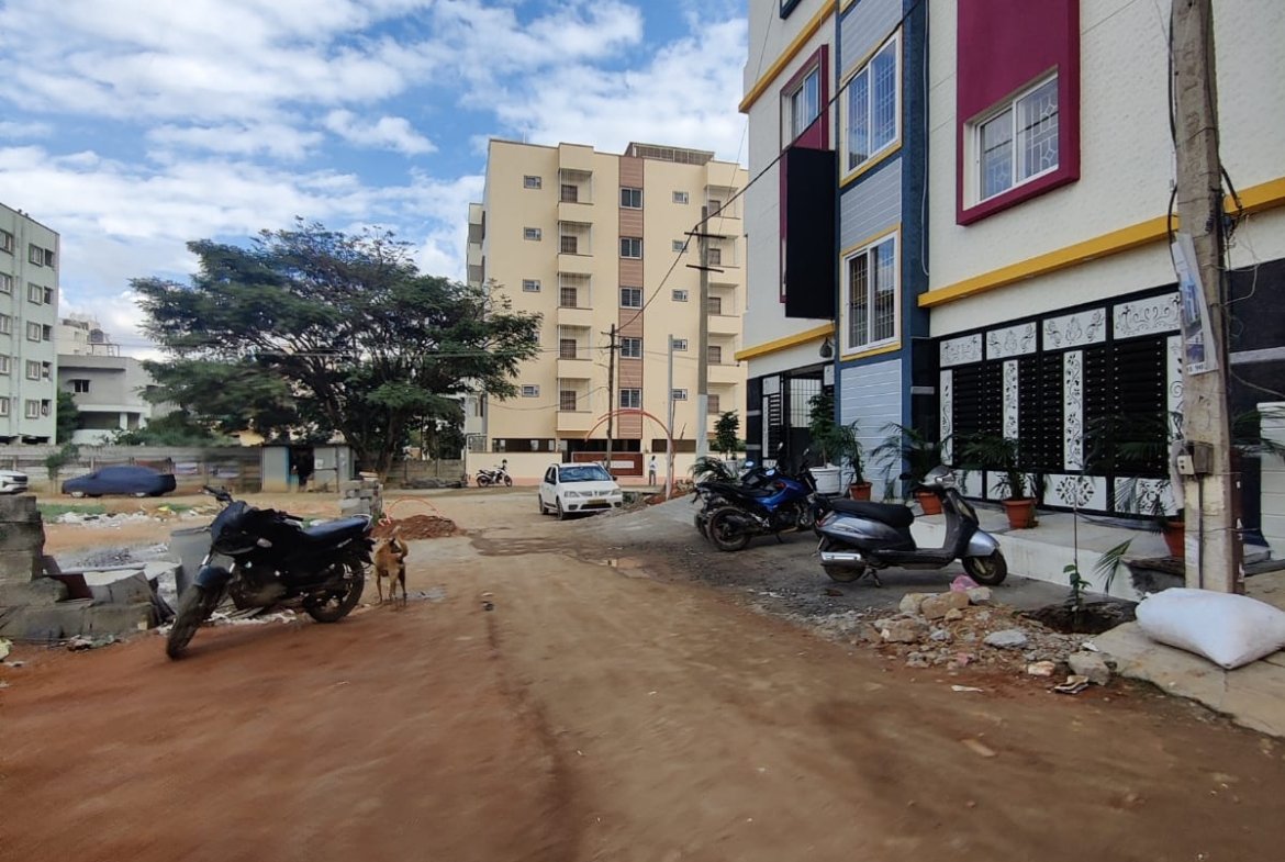 road in front of PG building near Kodathi Sarjapur Road Bangalore close to bus stop and IT hubs