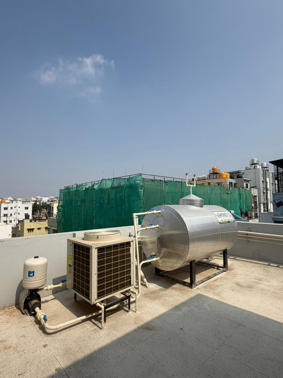 heat pump system in PG building Marathahalli Bangalore energy efficient water heating