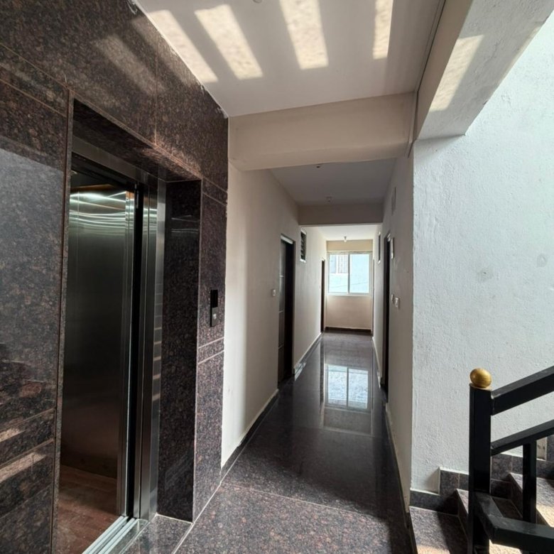 staircase area in PG building for sale in Marathahalli Bangalore well ventilated common area