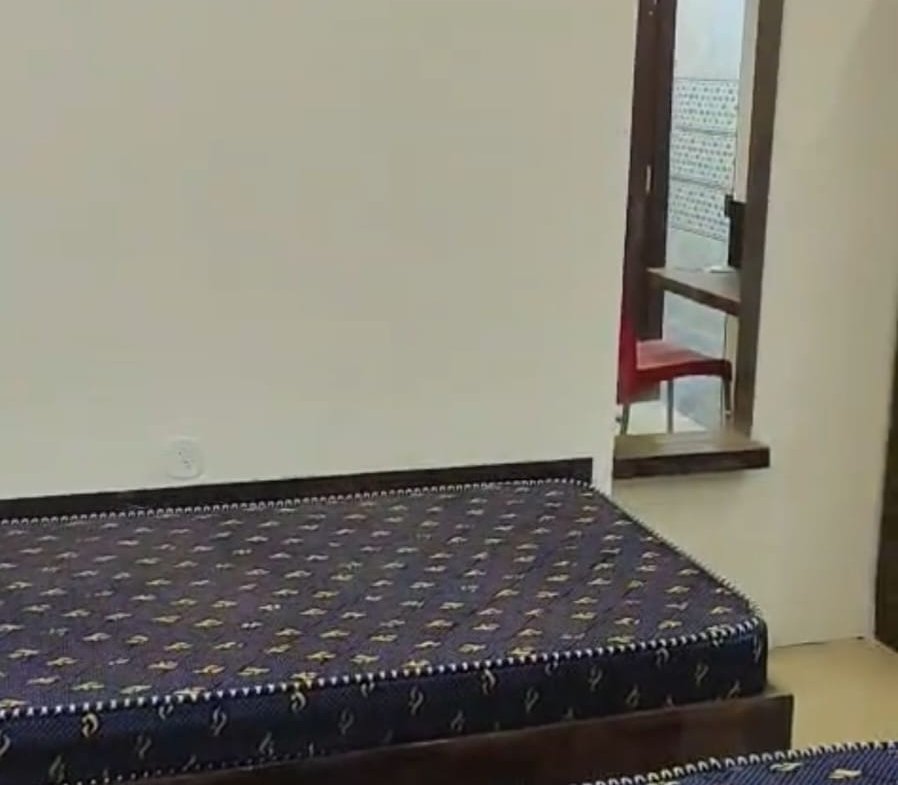 Modern furnished single room in new G+6 PG building SG Palya with bed wardrobe desk and attached bathroom