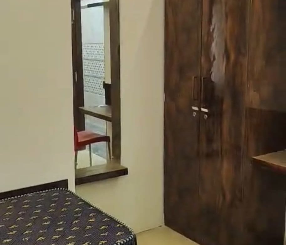 Modern furnished single room in new G+6 PG building SG Palya with bed wardrobe desk and attached bathroom