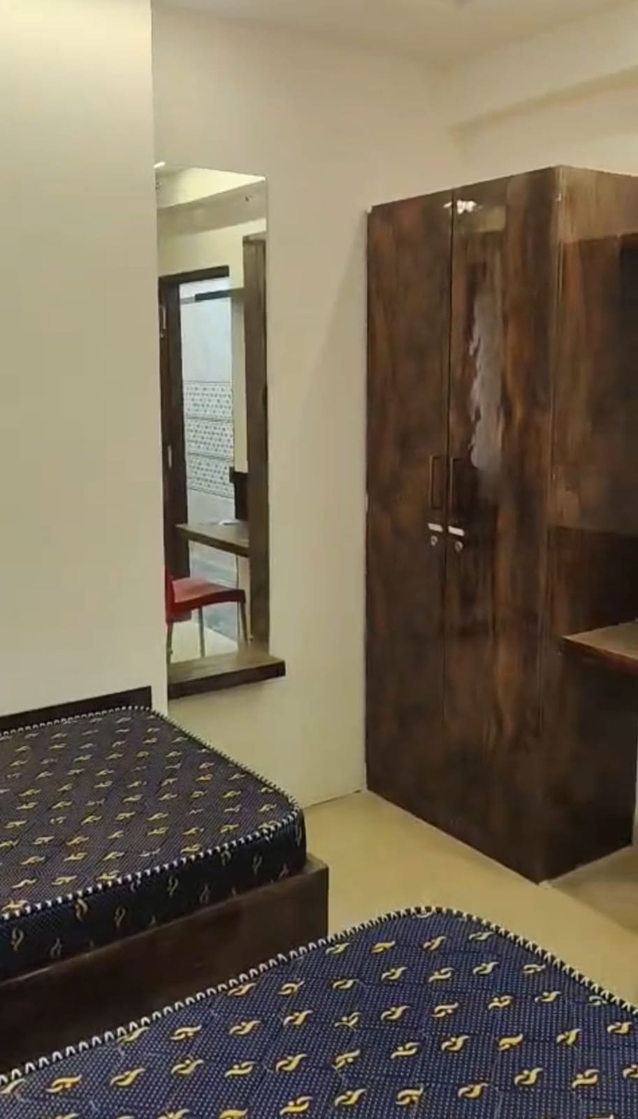 Modern furnished single room in new G+6 PG building SG Palya with bed wardrobe desk and attached bathroom