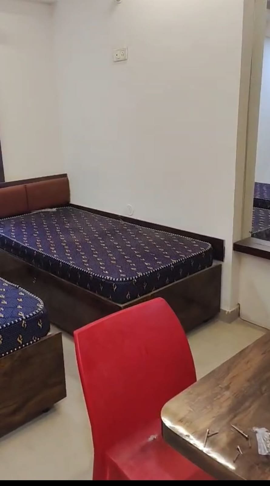 Modern furnished single room in new G+6 PG building SG Palya with bed wardrobe desk and attached bathroom