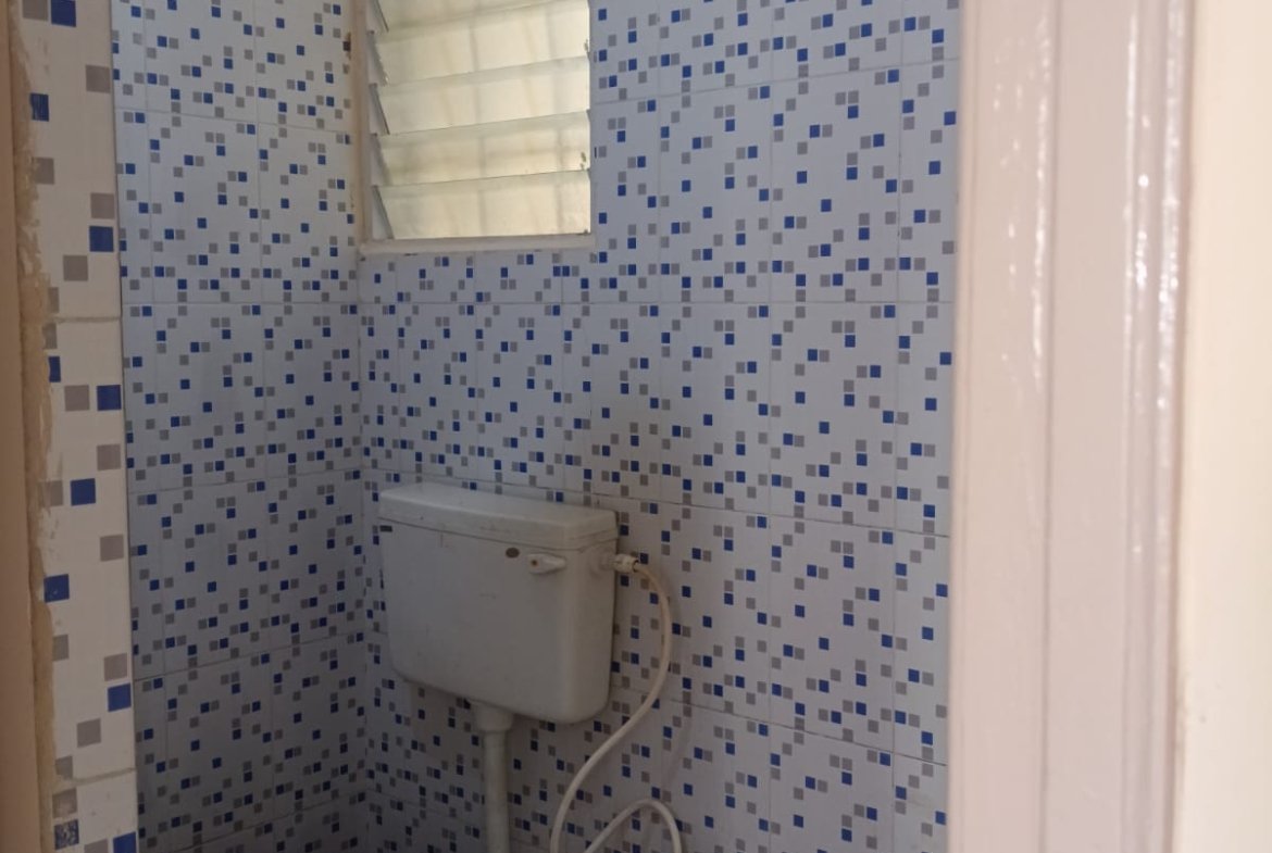 Western bathroom with geyser, shower and wash basin in furnished 2BHK flat