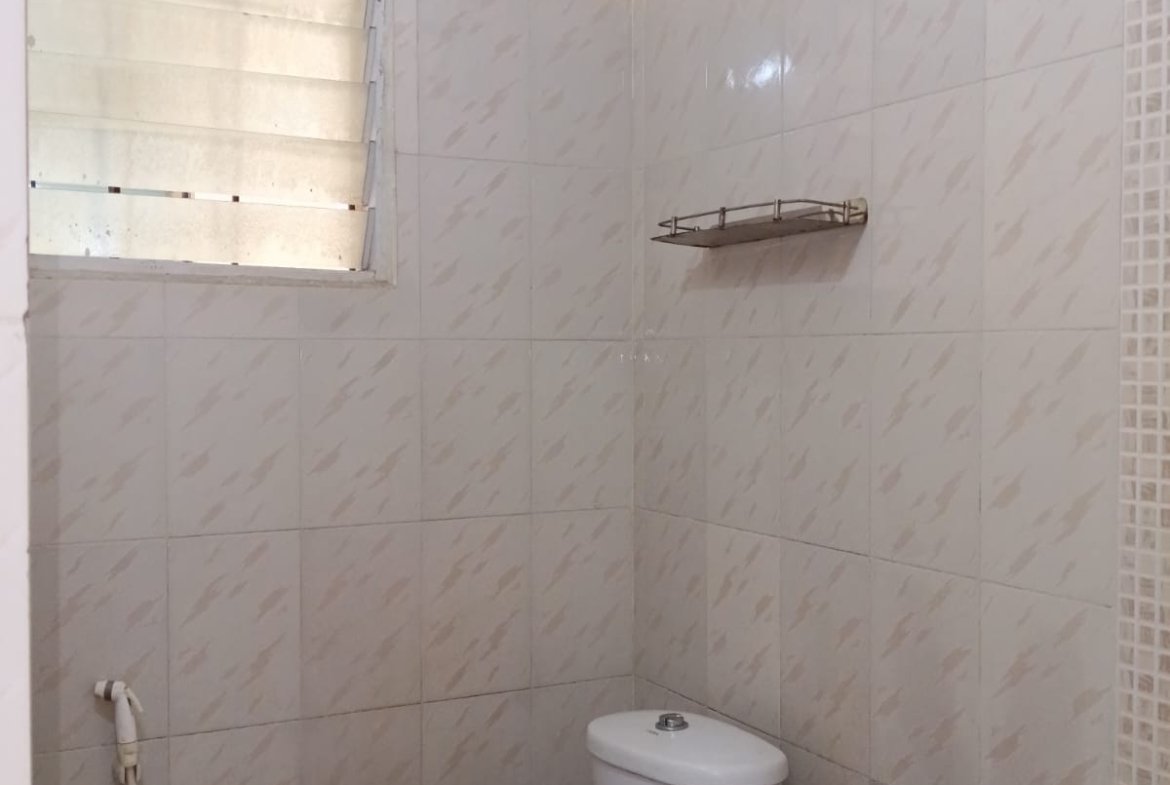 Western bathroom with geyser, shower and wash basin in furnished 2BHK flat