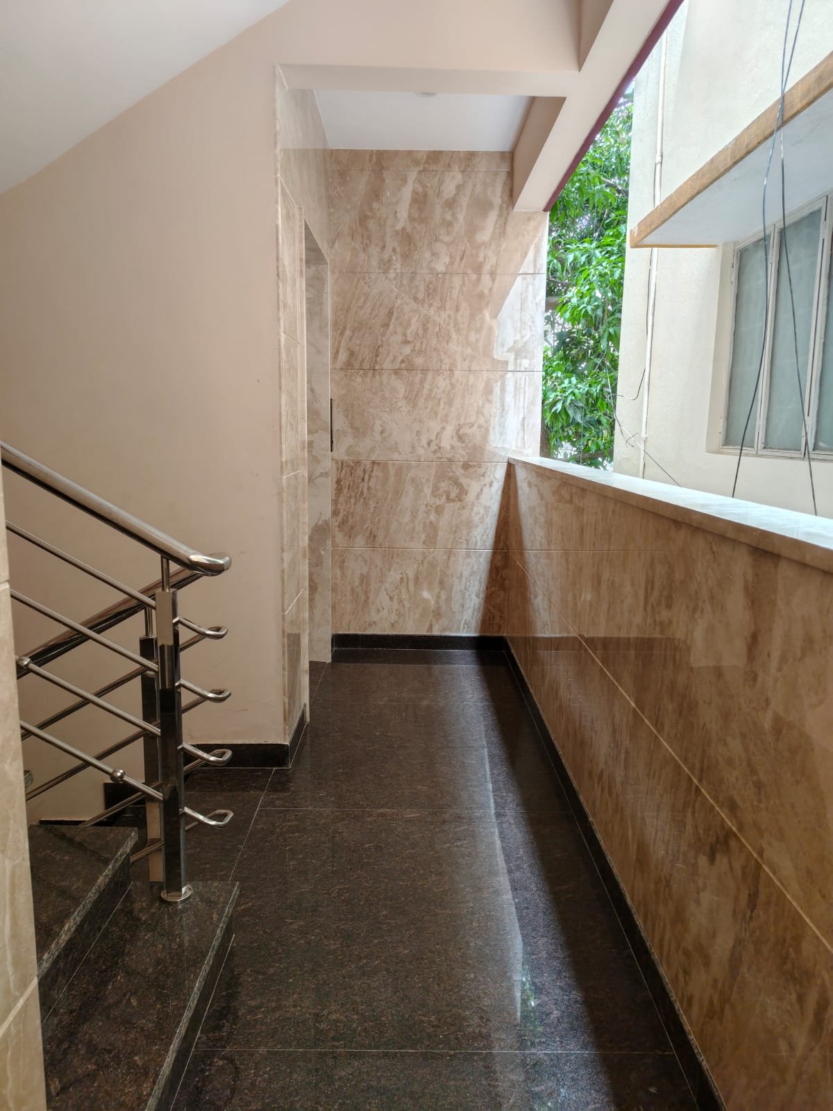 Balcony of 2BHK flat for rent in HSR Layout Sector 1 Bangalore with open view and ventilation