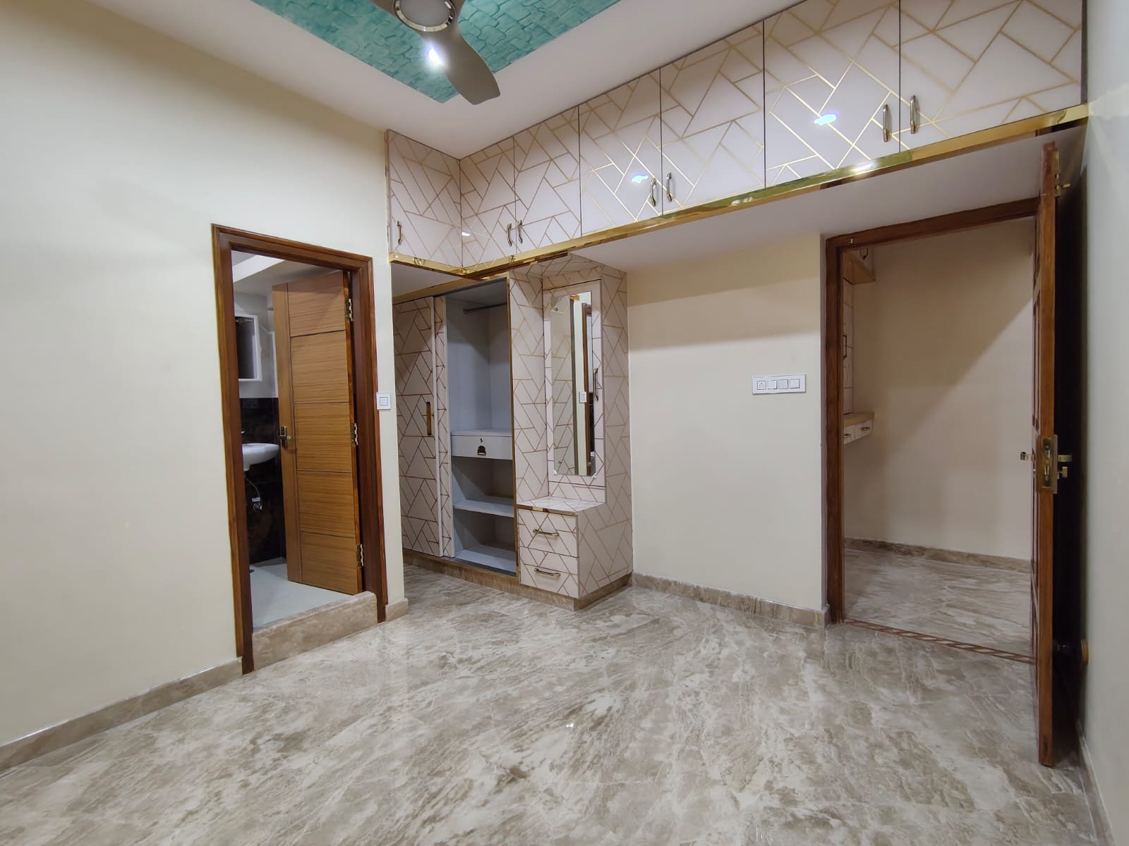 Bedroom with wardrobe in semi furnished 2BHK apartment for rent in HSR Layout Sector 1 Bangalore