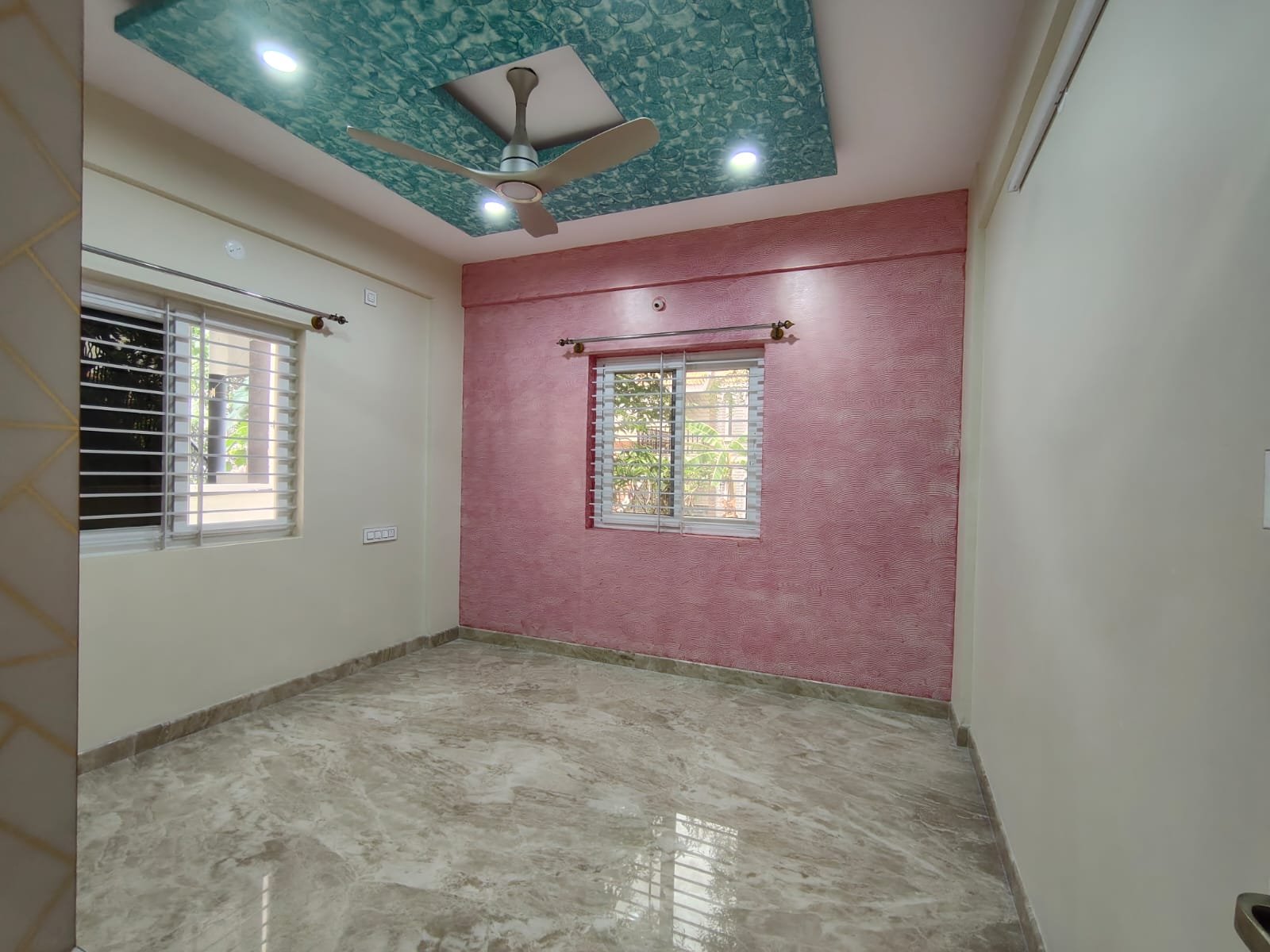 Bedroom with wardrobe in semi furnished 2BHK apartment for rent in HSR Layout Sector 1 Bangalore