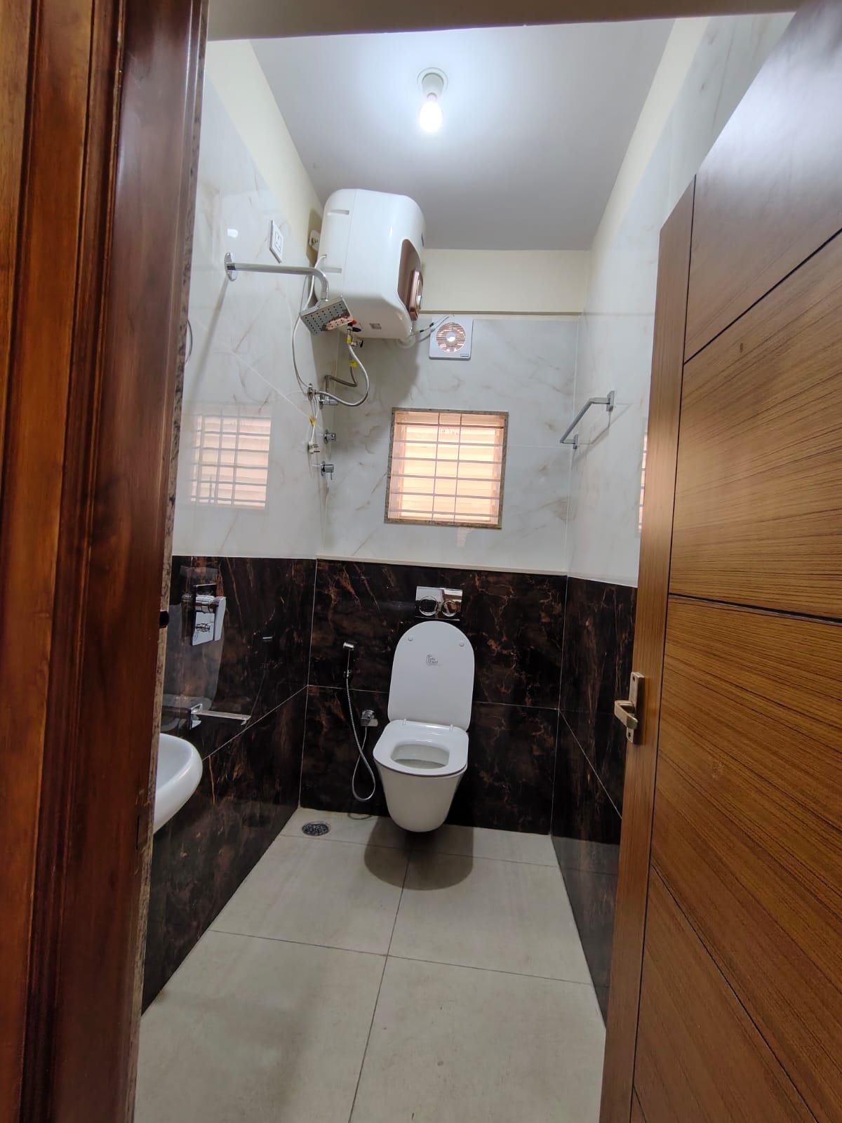 Attached and common bathroom in 2BHK semi furnished flat for rent in HSR Layout Sector 1 Bangalore