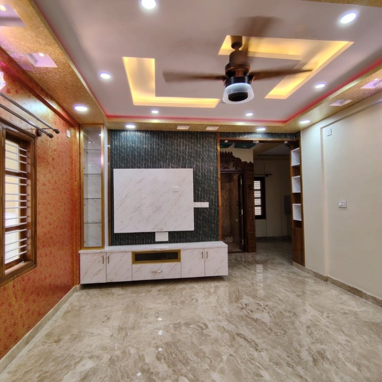 Spacious living room of semi furnished 2BHK flat in HSR Layout Sector 1 Bangalore with natural light and ventilation