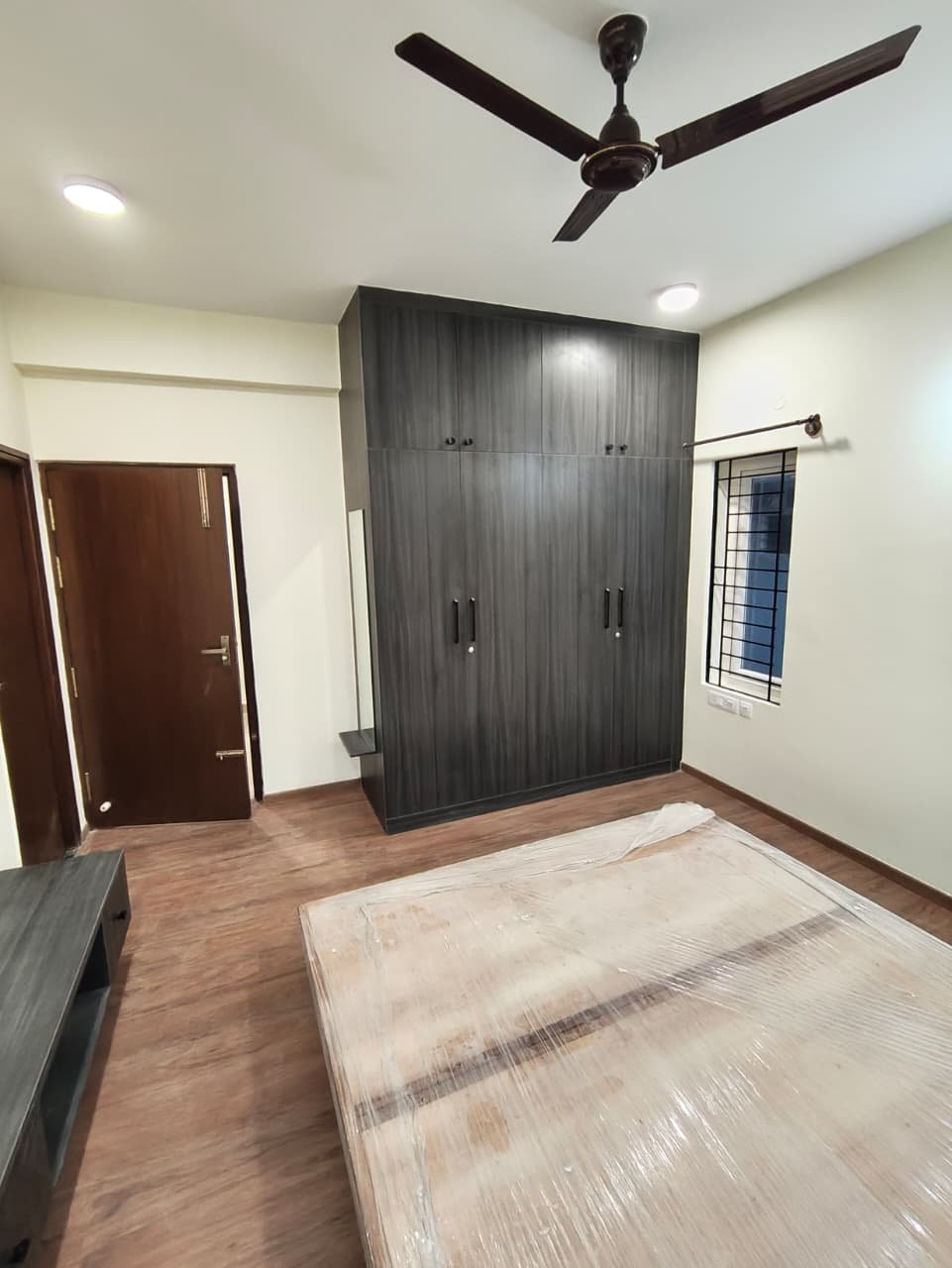 Bedroom in Woodsvale 4BHK Villa Bedroom with wardrobe in semi furnished villa Woodsvale Sarjapura