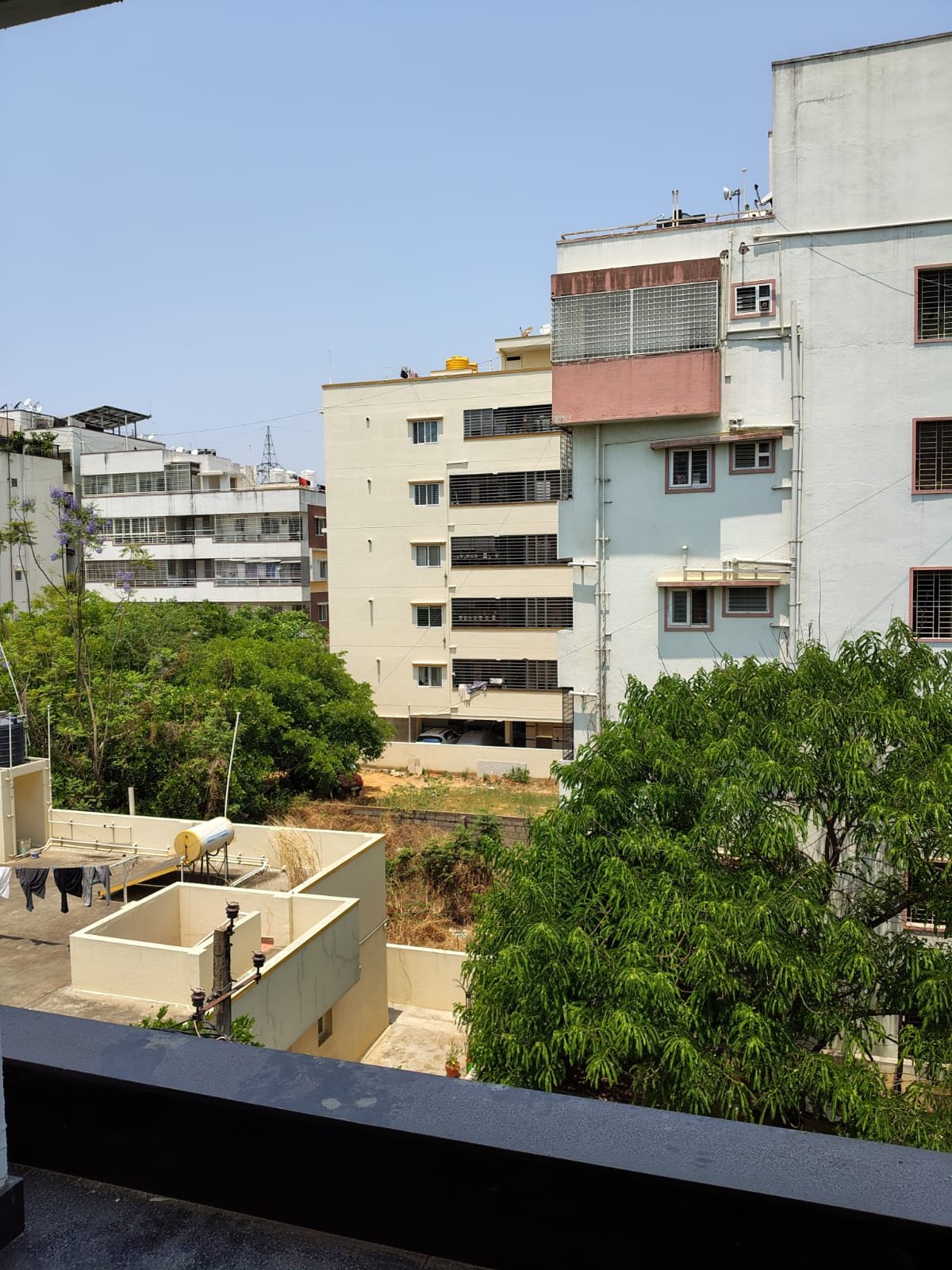 Spacious balcony view in 3BHK apartment with open ventilation and natural light