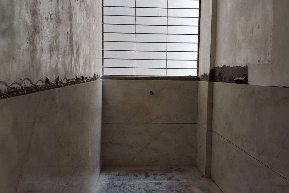 Spacious utility view in 3BHK apartment with open ventilation and natural light