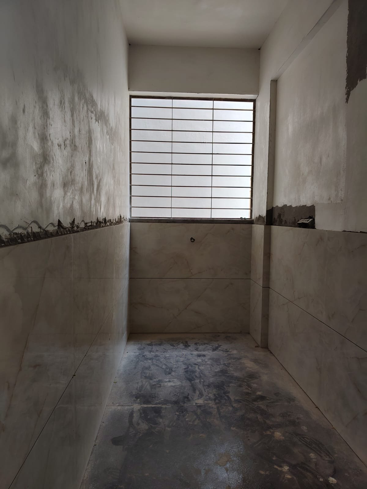 Spacious utility view in 3BHK apartment with open ventilation and natural light