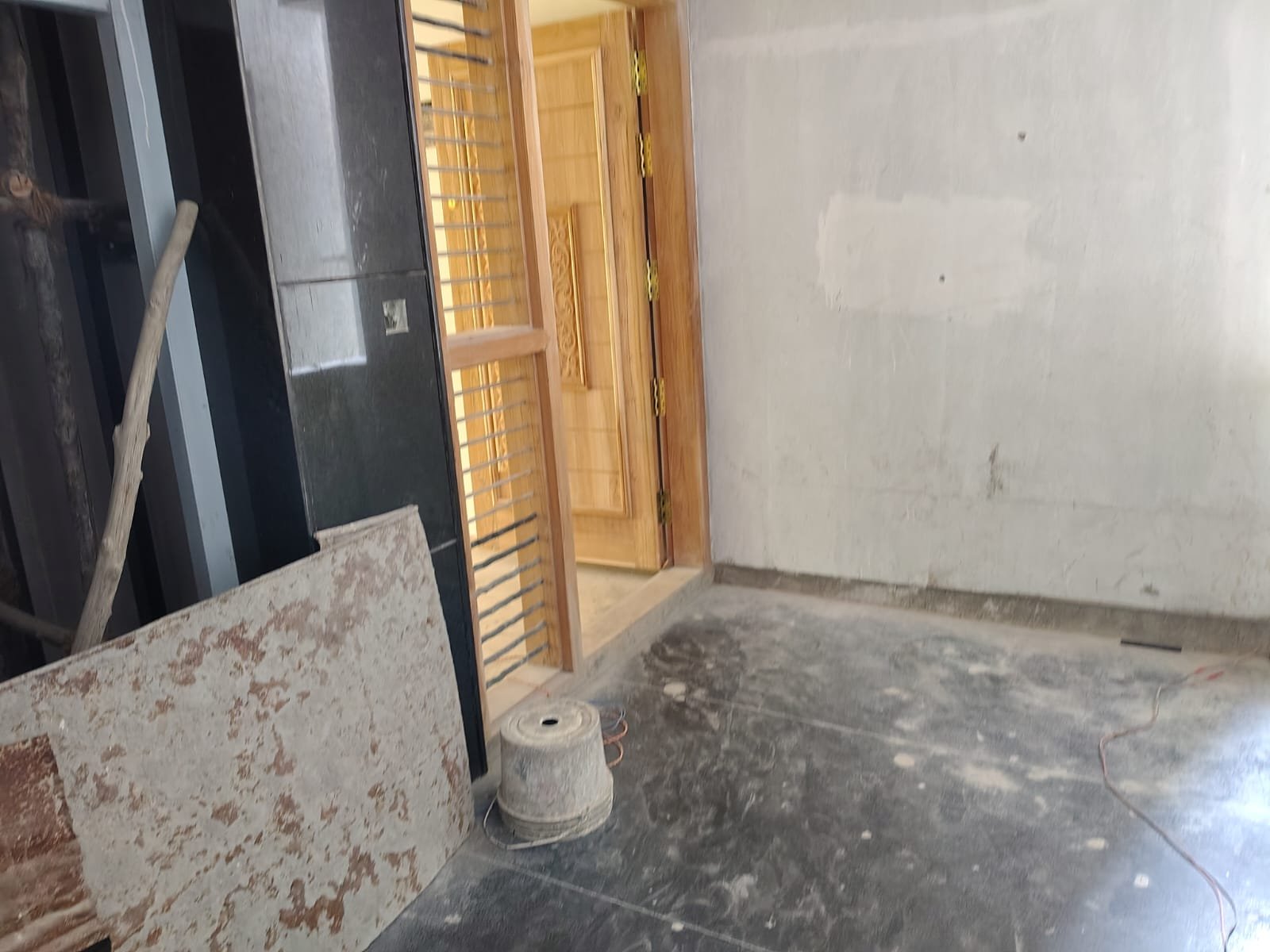 Modern passenger lift and granite finished staircase in apartment building