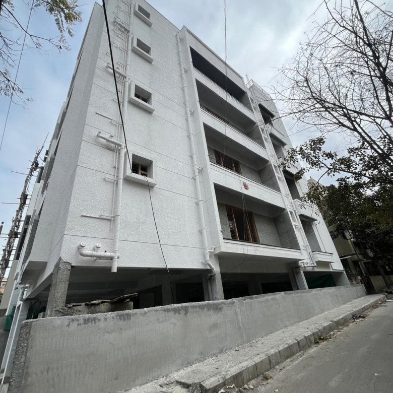 G+4 residential building for sale in Gottigere Bangalore with parking and modern architecture