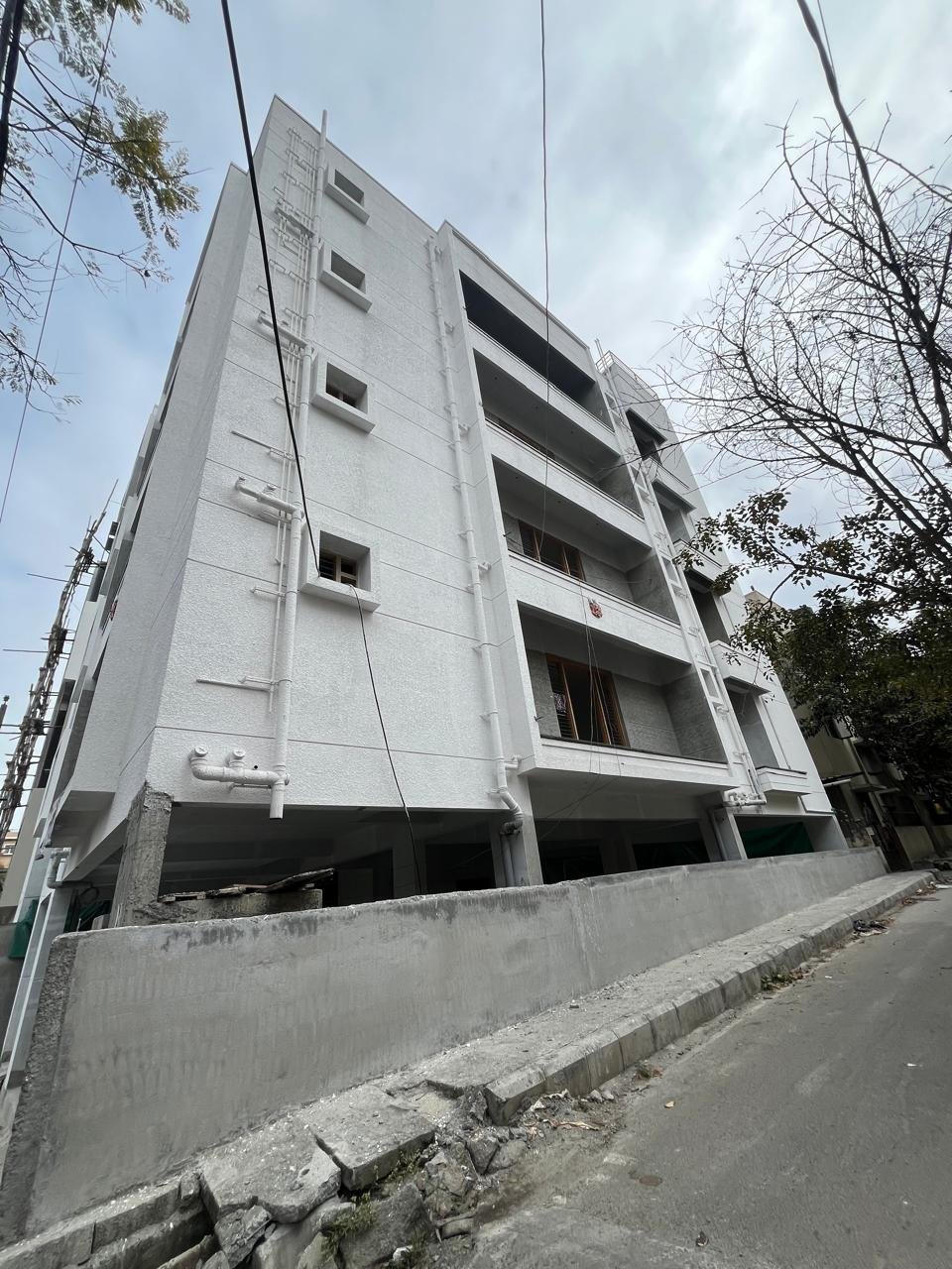 G+4 residential building for sale in Gottigere Bangalore with parking and modern architecture