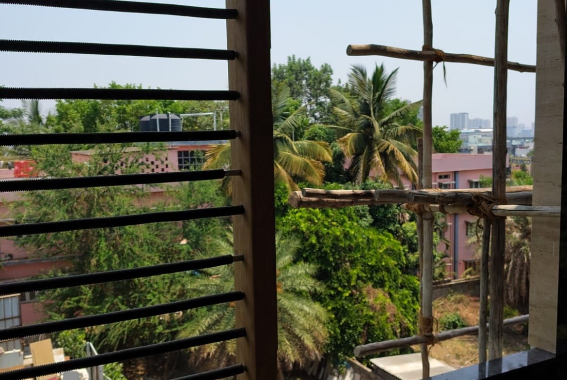 Spacious balcony view in 3BHK apartment with open ventilation and natural light