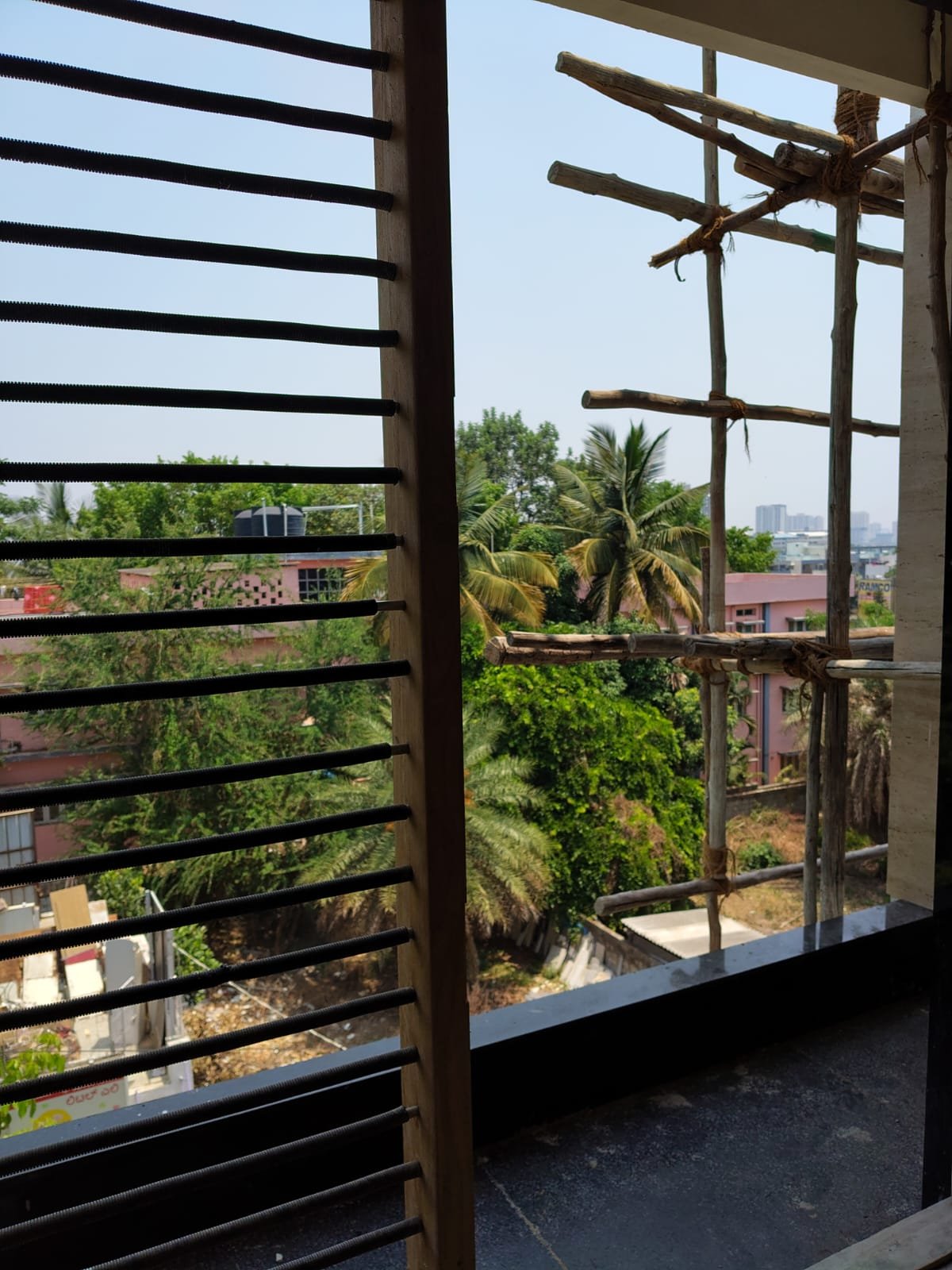 Spacious balcony view in 3BHK apartment with open ventilation and natural light