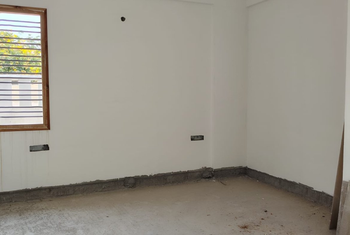 Master bedroom in 3BHK flat with balcony and natural ventilation