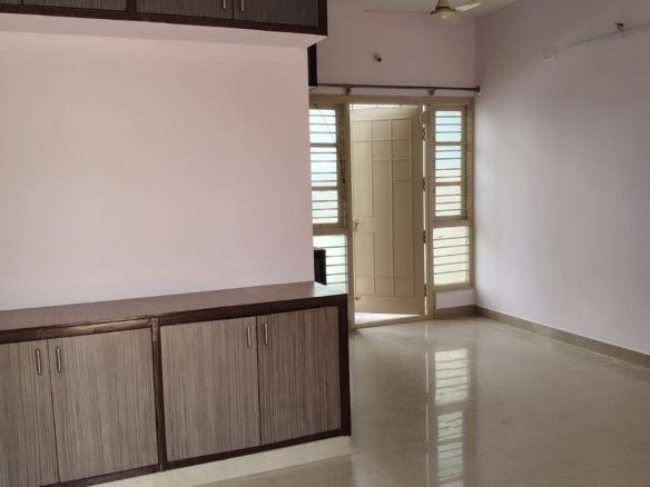 Spacious living room in 1BHK flat near Decathlon Bannerghatta Main Road with good ventilation